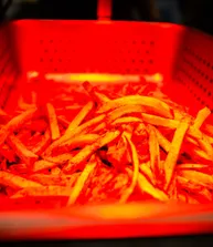 Loaded fries under the warmer